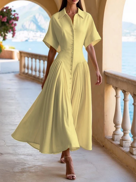 Light yellow button-down summer dress with flared skirt